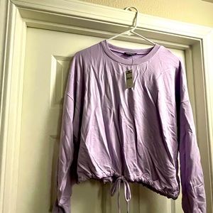 Long sleeve banded bottom sweatshirt. NWT.